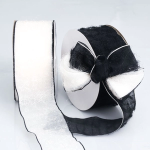 Fuzzy plush tassels ribbon rolls in black and white for DIY gift wrapping and bows