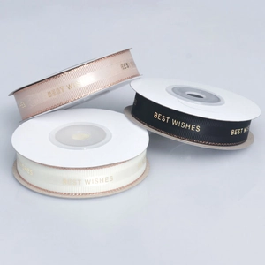 Three rolls of 1.5cm grosgrain ribbon with gold edge and Best Wishes metallic printing