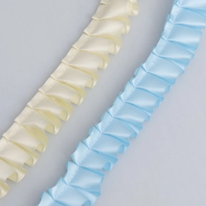 Pleated polyester satin ribbon with ruffle trim in cream yellow and light blue colors