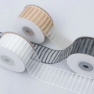 Metallic striped sheer ribbons in gold, white, and black for DIY gift packaging