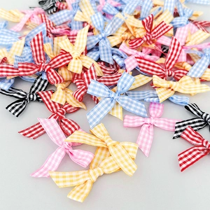 Assorted colorful plaid ribbon bows for DIY crafts and gift box decorations