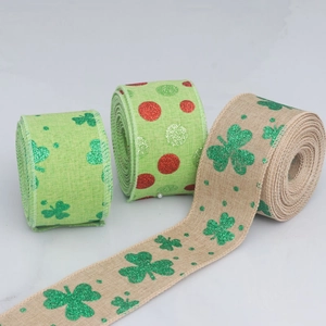Detailed view of Saint Patrick's Day wired ribbons with shamrocks and festive patterns