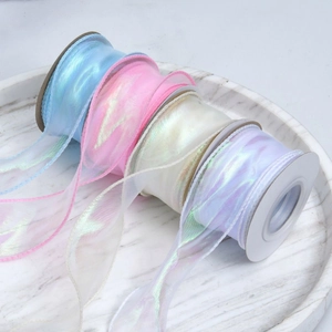 Iridescent organza ribbon set in four colors for gift wrapping and DIY crafts