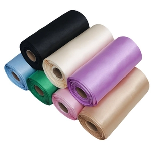 Multiple colors of 15cm wide satin ribbon rolls for wedding chairs and gift wrapping