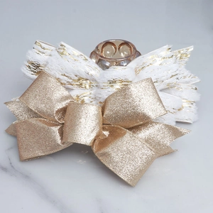 Sparkling pink and gold champagne Christmas glitter bows for festive tree and wreath decor