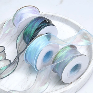 Irridescent fish tail yarn ribbons in four colors for floral and gift packaging