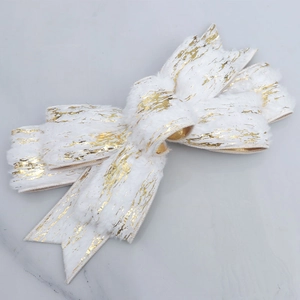Plush white Christmas bow with gold foil texture for tree and gift decoration