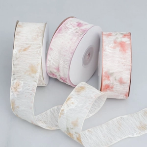 Detail of floral chiffon ribbon rolls for DIY bows and gift wrapping with vintage flower prints