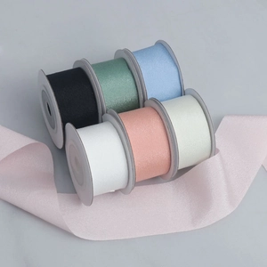 Rolls of matte high-elastic polyester ribbons in various colors for DIY hair accessories