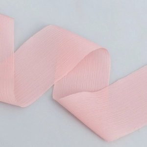 Translucent pink pleated chiffon ribbon for gift wrapping and DIY crafts hair accessories