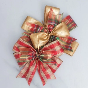 Handmade Christmas burlap bows with red and green plaid patterns for tree and gift decor