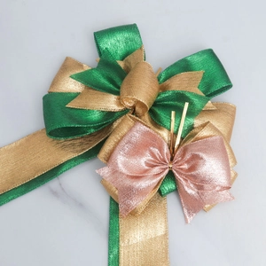 DIY burlap Christmas bow in green and gold metallic fabric for holiday gift wrapping decoration