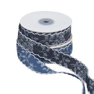 Blue denim style fabric ribbon with white leaf prints and wavy lace edges for DIY crafts