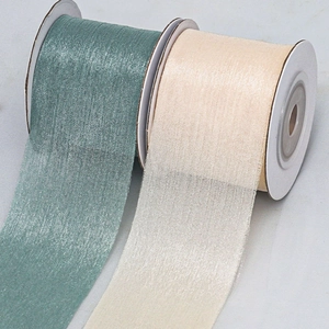 Sheer organza ribbon rolls in vintage teal and beige for DIY floral and cake decoration