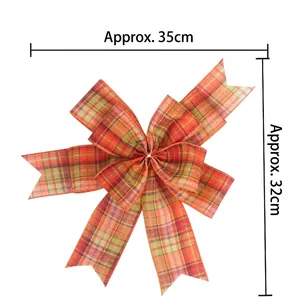 Plaid Christmas bow decoration in orange and green, approx 35cm x 32cm size