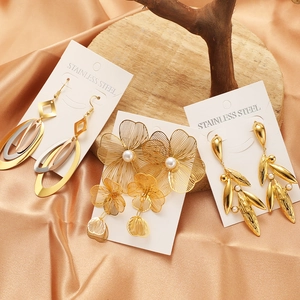Gold-plated stainless steel earrings set featuring floral and bow designs with pearls