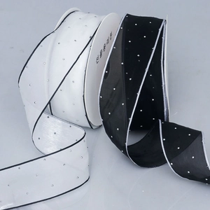 Sparkling rhinestones on sheer chiffon ribbons in black and white for luxury gift wrapping