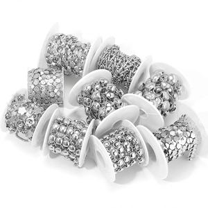 Silver stainless steel DIY chain set with various link patterns on white spools for jewelry