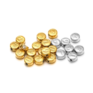 Flat round gold and silver stainless steel beads with numbers and letters for DIY jewelry