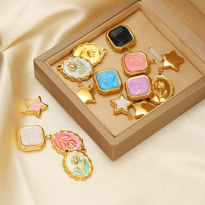 Golden stainless steel pendants with star, marble enamel square and tulip flower relief