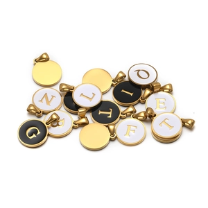 Golden stainless steel round letter charms with black and white enamel drip oil finish