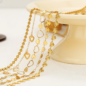 Elegant 18K gold-plated heart-shaped stainless steel chain necklaces on display stand