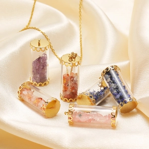 Cylinder glass bottle pendant with colorful crushed stones and gold floral cap