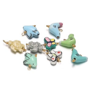 Hand-painted ceramic animal charms including sea turtle and bird for DIY jewelry making