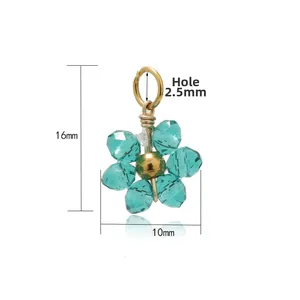 Detail showing 16mm x 10mm teal crystal flower charm with dimensions and gold loop