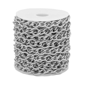 Close-up of silver stainless steel thick curb chain neatly wound on a plastic spool