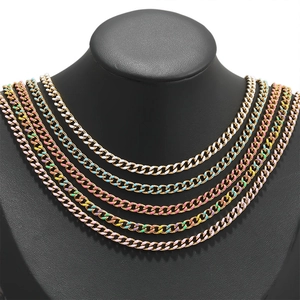 Detailed view of layered colorful enamel Cuban link chains on a black neck display stand
