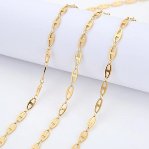 Close-up of 4mm 18k gold vacuum plated stainless steel anchor link chain on a prop