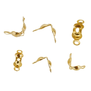 Macro view of gold stainless steel folding bead tip connectors for jewelry making