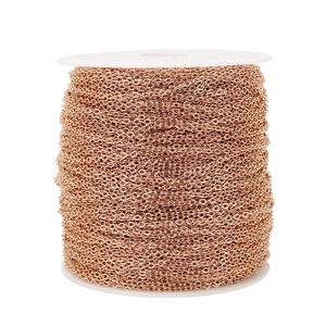 Macro shot of rose gold flat cable chain spool for DIY jewelry making and necklaces