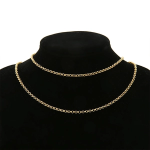 Detail view of 18k gold plated stainless steel rolo chain on a black jewelry bust display