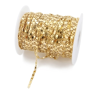 Close-up of 18k gold-plated 2.7mm stainless steel chain on spool for DIY jewelry