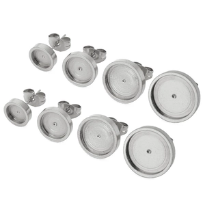 Detail of DIY stainless steel earring bezel settings in four sizes with back stoppers