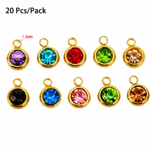 Pack of 20 mixed color 6mm round crystal pendants with gold-plated stainless steel borders