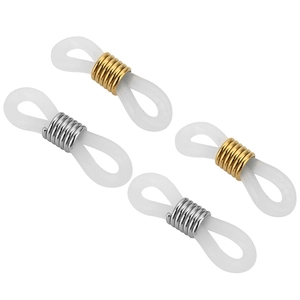 Detail of adjustable gold and silver spring metal connectors for eyewear straps
