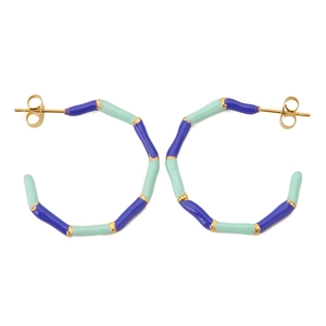 Detail of bamboo joint C-shape hoop earrings with blue and green enamel and gold accents