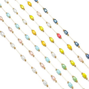 Close-up of 1mm gold chain with multi-color faceted glass beads for DIY jewelry making
