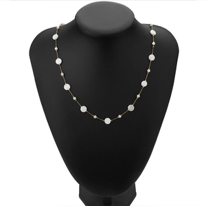 18k gold plated stainless steel necklace with 8mm white shell beads on neck model