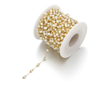 Detail of 8mm shell beads on an 18k gold-plated stainless steel chain for DIY jewelry making
