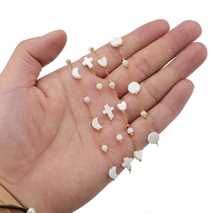 18k gold plated stainless steel necklace with mother of pearl moon heart and cross charms