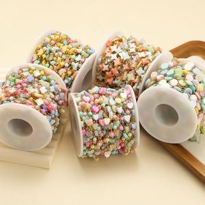 Rolls of gold chain with macaron color heart and clover beads for DIY jewelry