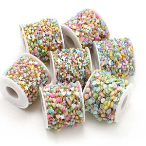 Colorful shell bead chain set with stars and hearts on spools for DIY jewelry making