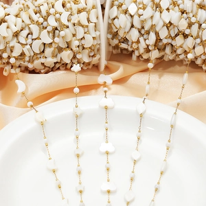 Golden stainless steel chain with white shell moon star flower heart charms on silk