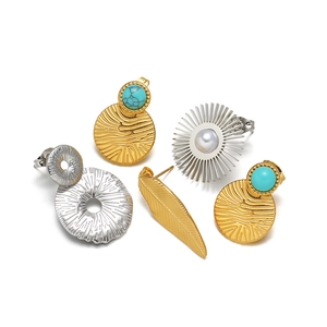 Vintage 18k gold and silver earring set with pearls, turquoise, and sunflower designs