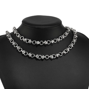 Polished stainless steel ball and loop link necklace displayed on a neck model