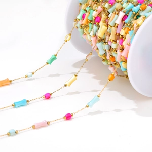 Colorful heart rhombic bead chain in gold finish on white spool for DIY jewelry making
